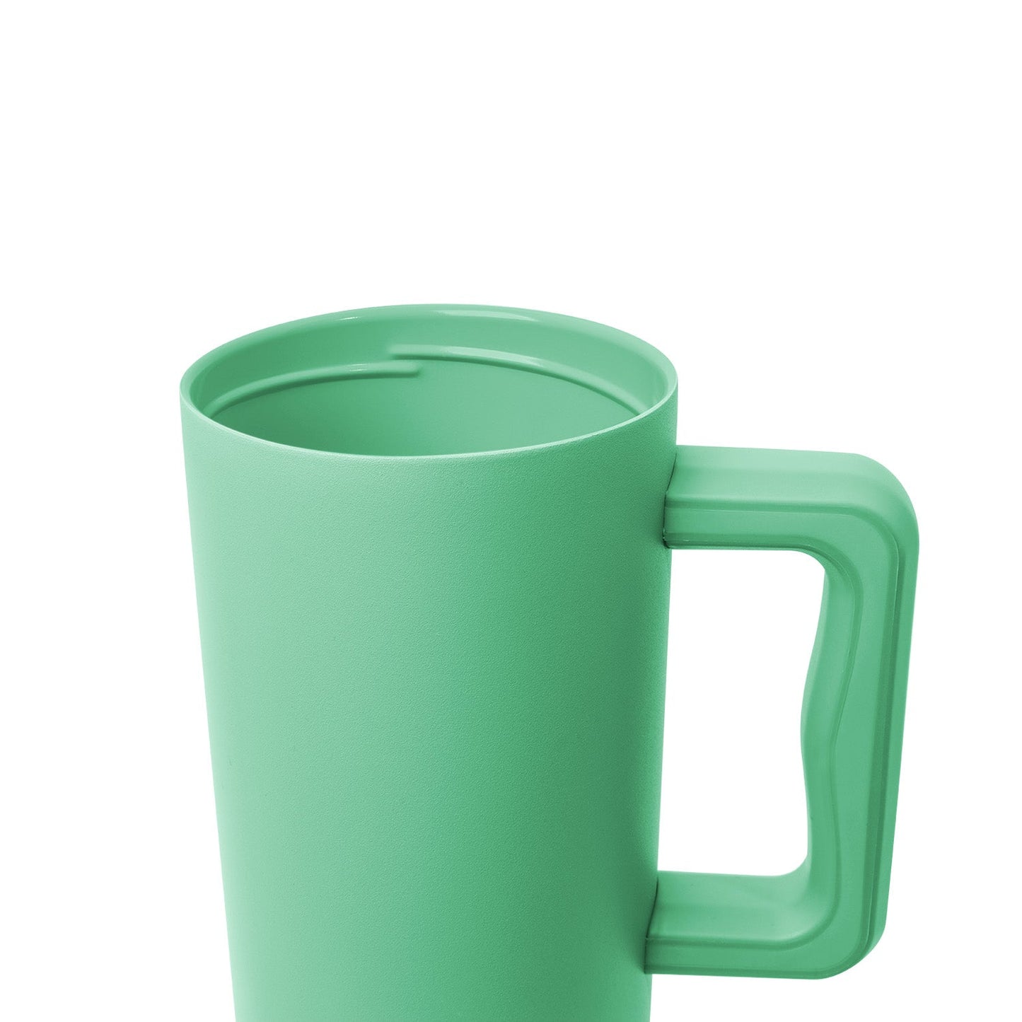 Pale green matte ceramic mug with handle, glossy rim detail, and seafoam interior finish