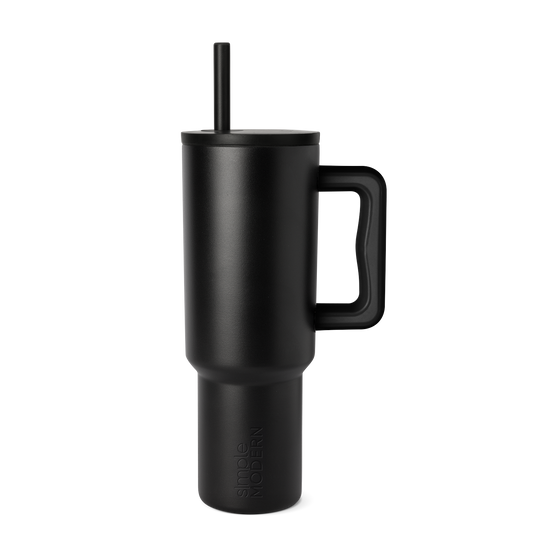 Matte black tumbler with gray tonal variations on white background