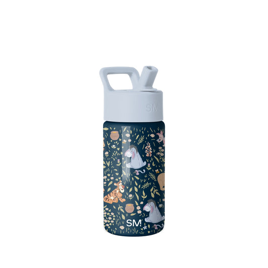 Simple Modern insulated water bottle with gray flip-straw lid and carry handle. Dark navy body features hand-drawn woodland animals, birds, and botanical illustrations in cream, tan, rust, and pink tones.