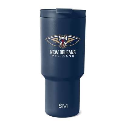 Deep navy blue insulated tumbler with matte finish and gold accents on winged logo and text