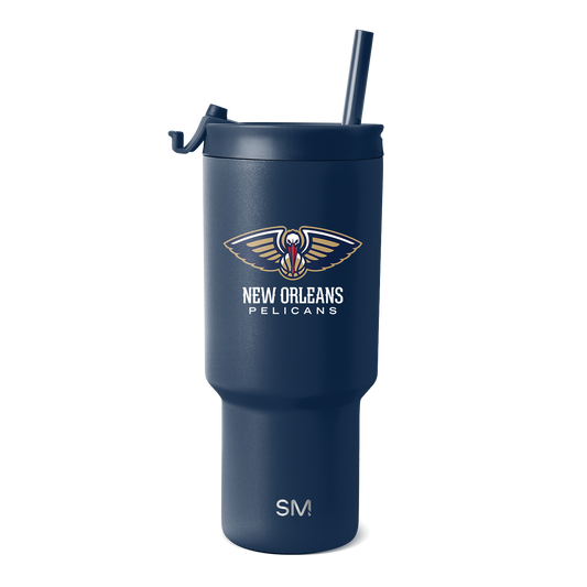 Navy blue drinkware with gold and cream logo accents, white text details