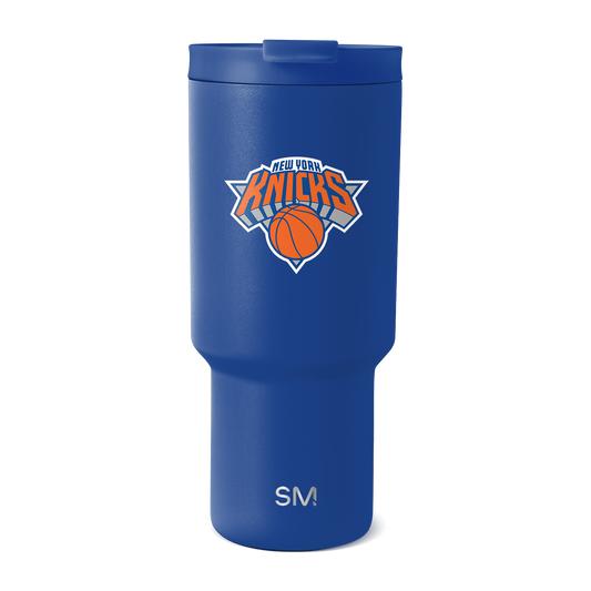 Royal blue metallic tumbler with white accents, featuring a pearlescent finish that catches light across the surface