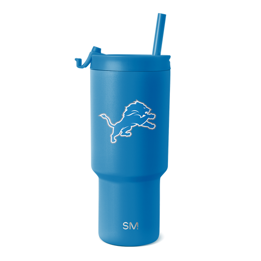 Medium blue tumbler with white logo and text accents, detailed product view