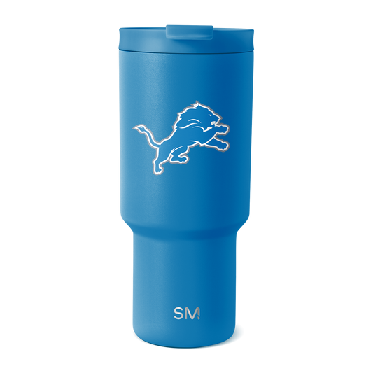 Bright cobalt blue tumbler with white logo and branding elements on clean white background