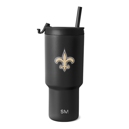 Matte black tumbler with gold and white logo design on white background