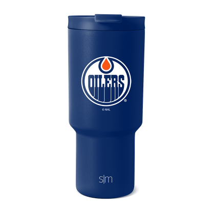 Royal blue insulated tumbler with white accents and integrated lid, shown against white background.