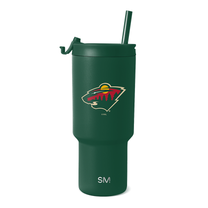 Forest green stainless steel tumbler with cream-colored branding accents