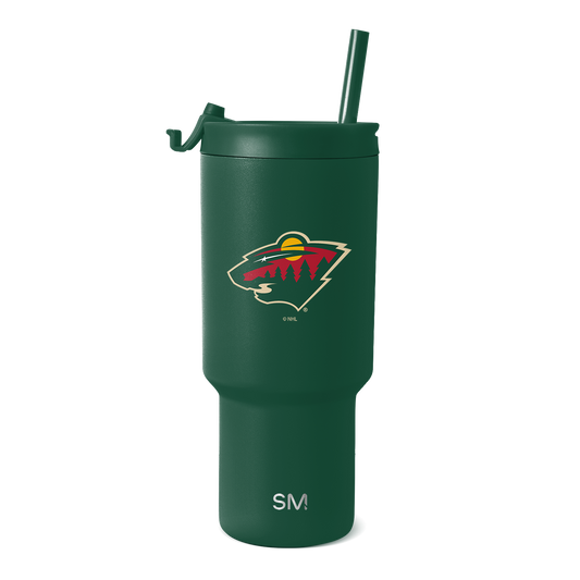 Forest green stainless steel tumbler with cream-colored branding accents