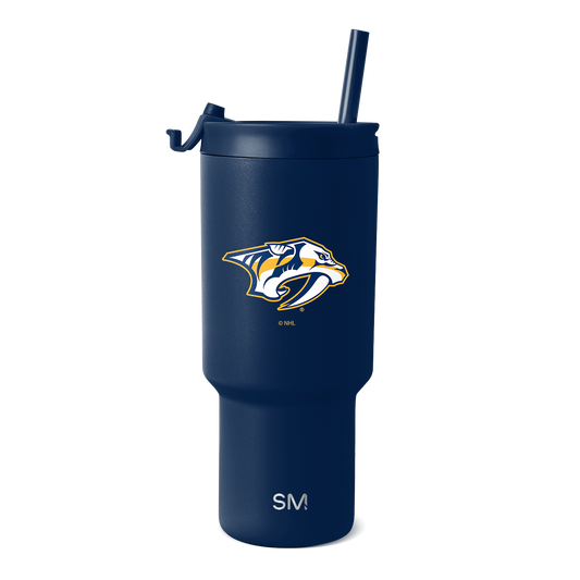 Deep navy blue insulated tumbler with navy lid and tapered base, shown against white background