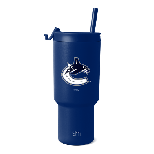 Navy blue insulated tumbler with white and silver metallic team logo and branding accents on cylindrical body and lid