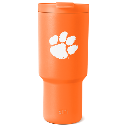 Bright orange tumbler with white graphic design and branding