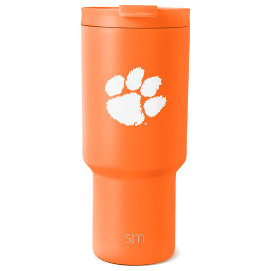 Bright orange tumbler with white graphic design and branding