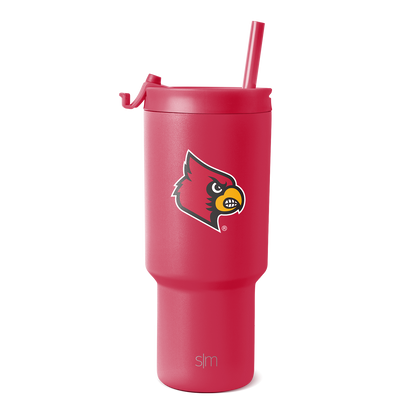 Coral red insulated tumbler with stainless steel construction, shown against white background