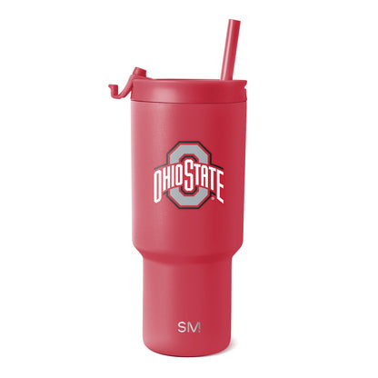 Vibrant coral-red tumbler with matching red straw and lid closure on white background.
