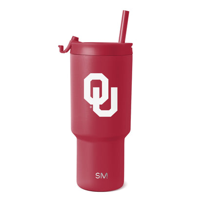 Crimson red matte tumbler with matching red straw and Simple Modern logo