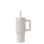 Cream-colored tumbler with handle and reusable straw, modern design with warm beige undertones