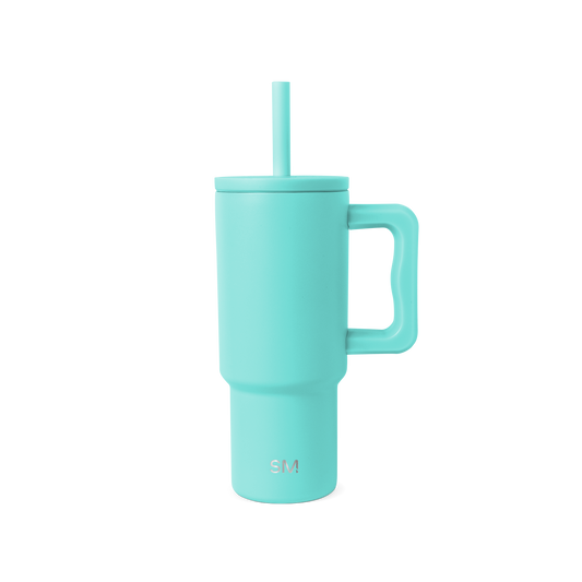 Soft turquoise blue-green cylindrical vessel with matching handle and lid, shown against neutral background.