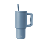Soft blue-gray ceramic tumbler on white background, featuring a muted slate tone with cool undertones. Product shot for e-commerce display.