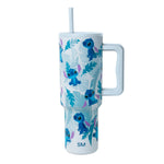 Pale blue tumbler with royal blue, teal, cyan, and purple botanical leaf accents