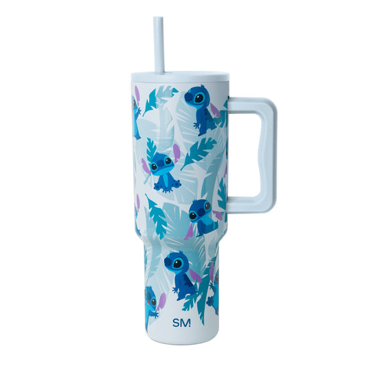 Pale blue tumbler with royal blue, teal, cyan, and purple botanical leaf accents