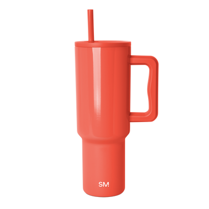 Coral-red tumbler with white background