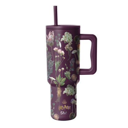 Purple tumbler with botanical illustration pattern featuring cream, pale pink, soft green, and muted gold accents