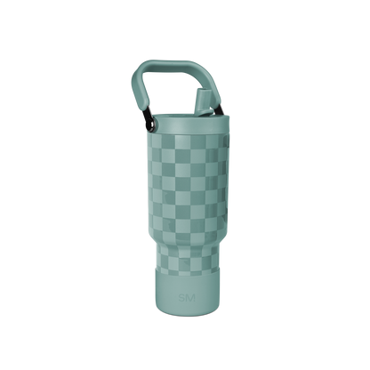 Sage green cylindrical container with checkerboard pattern in two tones of green, featuring matching handle and base