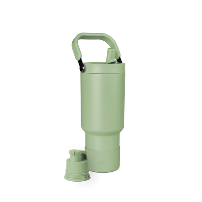 Soft sage green water bottle with black carabiner clip attachment, product view.