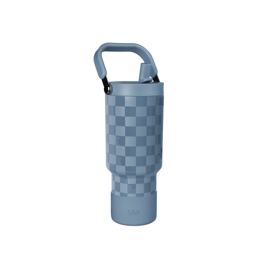 Blue ceramic mug with checkerboard pattern, slate blue body with muted blue tones, modern minimalist design
