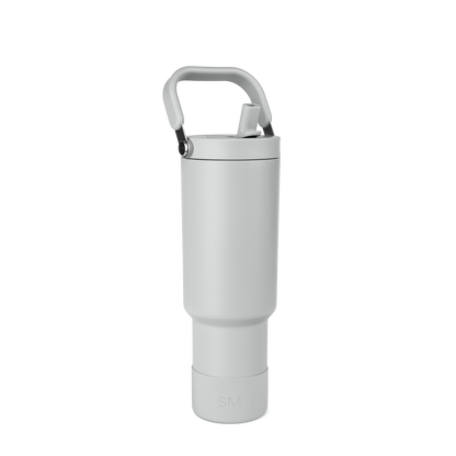 White thermal bottle with gray handle and black metallic hardware at top connection point
