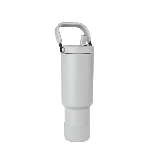 White thermal bottle with gray handle and black metallic hardware at top connection point