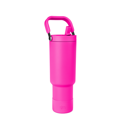 Hot pink insulated bottle carrier with modern design, front view showing the carrier's shape and structure for holding beverages.