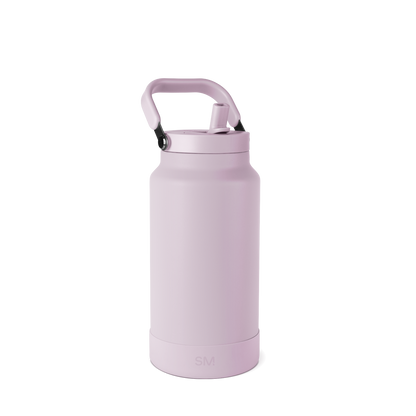 Mauve-pink cylindrical bottle with handle and black lid on white background