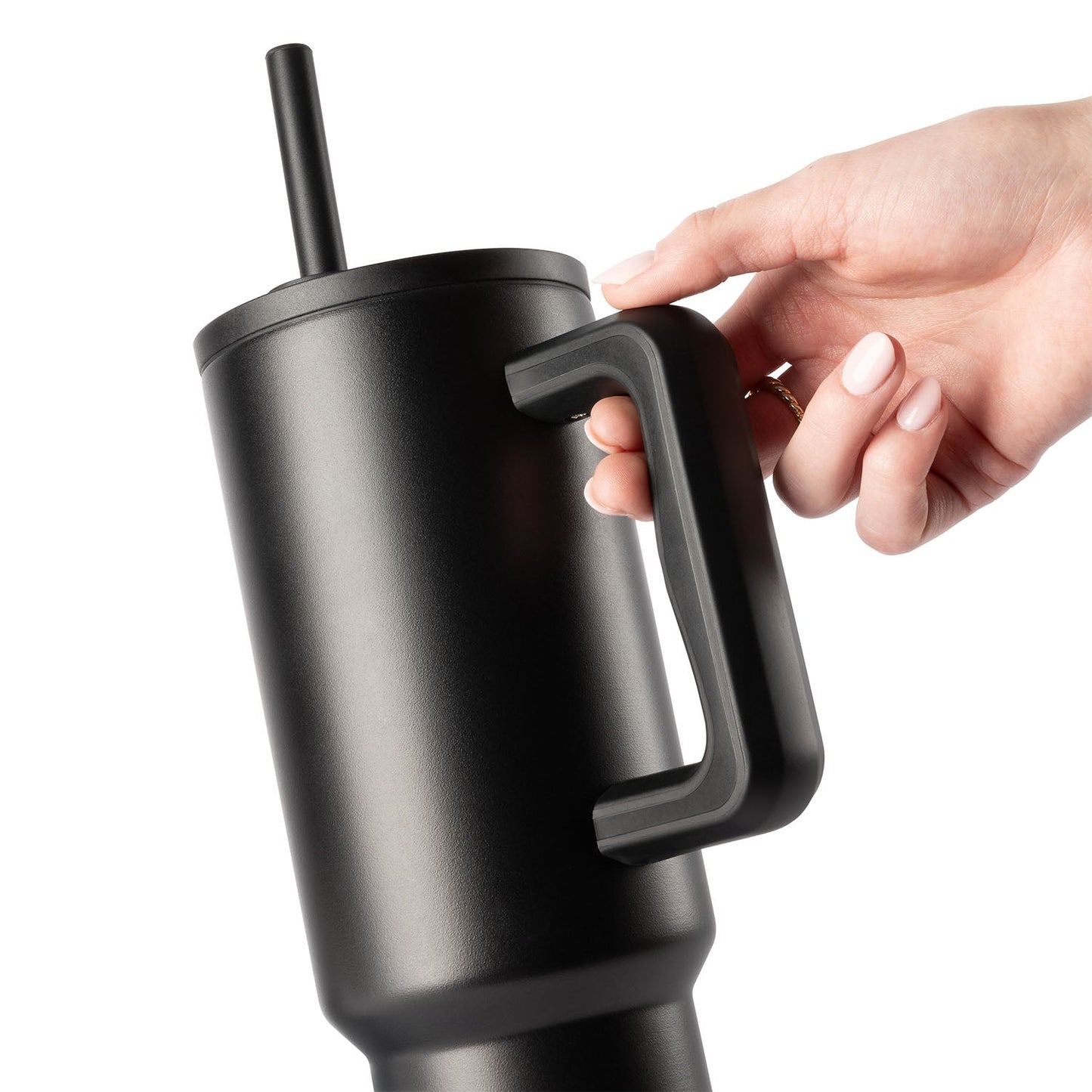 Black matte tumbler with easy-grip handle, featuring subtle gray undertones on cylindrical surface against neutral background
