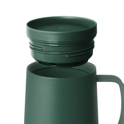 Sage green insulated tumbler with matching lid, featuring a muted dusty forest green color throughout the cylindrical mug body and top.