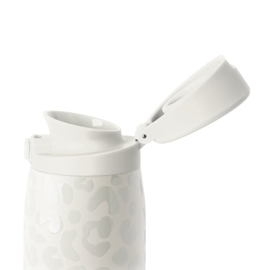 White ceramic drinkware set with cream and ivory tones on a light gray-white background